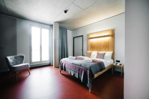 Postel nebo postele na pokoji v ubytování Hotel Rossi