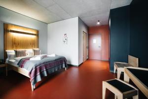 Postel nebo postele na pokoji v ubytování Hotel Rossi