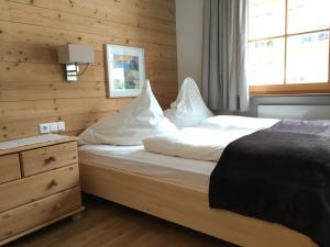 Postel nebo postele na pokoji v ubytování Haus Waldegg