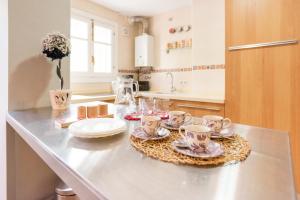 Kuchyňa alebo kuchynka v ubytovaní Mundo Nuevo: Acogedor Apartamento en el Centro