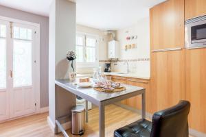 Kuchyňa alebo kuchynka v ubytovaní Mundo Nuevo: Acogedor Apartamento en el Centro