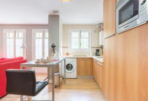 Kuchyňa alebo kuchynka v ubytovaní Mundo Nuevo: Acogedor Apartamento en el Centro