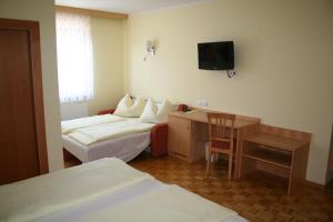 Łóżko lub łóżka w pokoju w obiekcie Hotel Restaurant Thadeushof