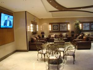 Reštaurácia alebo iné gastronomické zariadenie v ubytovaní Manazilna Apartments Riyadh