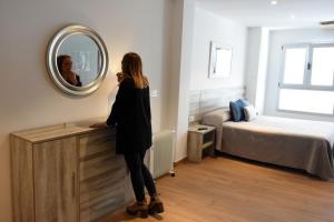 Postel nebo postele na pokoji v ubytování Ardales Loft