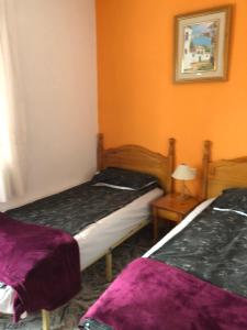 Postel nebo postele na pokoji v ubytování Apatament La Loma