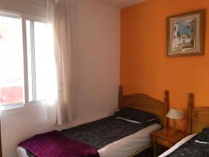 Postel nebo postele na pokoji v ubytování Apatament La Loma