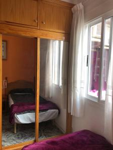 Postel nebo postele na pokoji v ubytování Apatament La Loma
