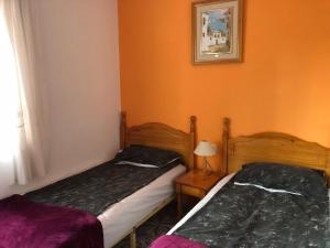 Postel nebo postele na pokoji v ubytování Apatament La Loma