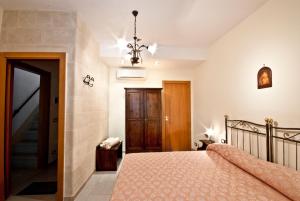 Postel nebo postele na pokoji v ubytování B&B Casa Cimino - Monopoli - Puglia