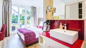 Postel nebo postele na pokoji v ubytování Hotel Volapük