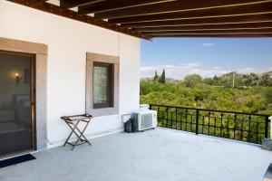 A balcony or terrace at Villa Mertcan by Important Group Travel BD439
