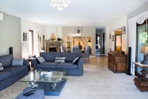 A seating area at Villa Mertcan by Important Group Travel BD439
