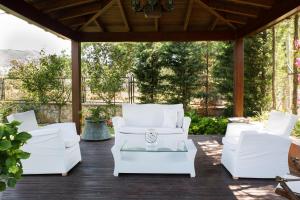 A seating area at Villa Mertcan by Important Group Travel BD439