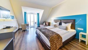 Postel nebo postele na pokoji v ubytování Hotel Volapük + 29 fotografií