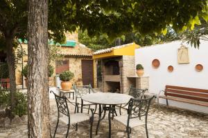 Patio lub wspólna przestrzeń na świeżym powietrzu w obiekcie Cortijo La Algallumbilla