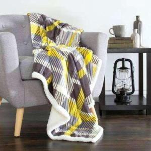a blanket on a chair in a living room at Forest View in Creswick