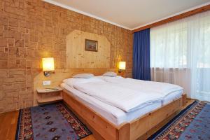 Katil atau katil-katil dalam bilik di APART Landhaus Gstrein
