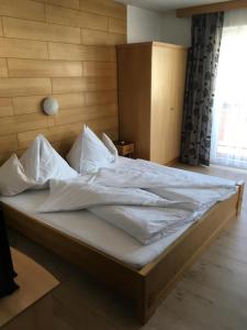 Ein Bett oder Betten in einem Zimmer der Unterkunft Haus Rimml