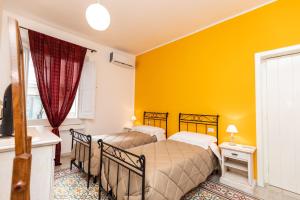 Postel nebo postele na pokoji v ubytování Casa Duconte