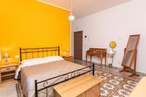 Postel nebo postele na pokoji v ubytování Casa Duconte