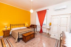 Postel nebo postele na pokoji v ubytování Casa Duconte