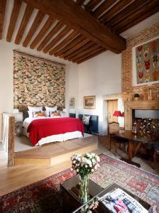 Cama o camas de una habitación en Le Domaine de Fleury - Pierres d'Histoire