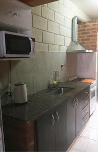 A cozinha ou cozinha compacta de Casa Nuova Depto DOS y TRES