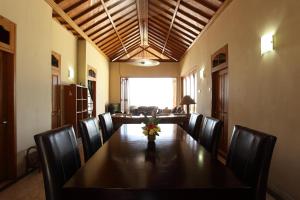 a conference room with a long table and chairs at Villa Rama in Candidasa
