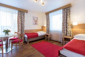 מיטה או מיטות בחדר ב-Hotel Diana