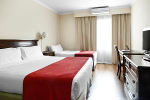 Voodi või voodid majutusasutuse Cyan Américas Towers Hotel toas