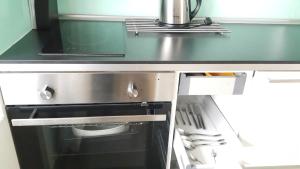 Dapur atau dapur kecil di Bastien Studio near Airport
