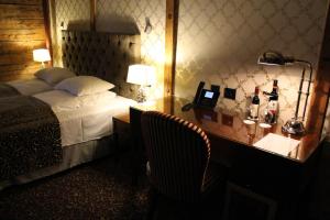 Postel nebo postele na pokoji v ubytování Det Hanseatiske Hotel