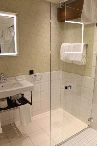 Koupelna v ubytování Det Hanseatiske Hotel