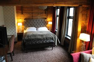 Postel nebo postele na pokoji v ubytování Det Hanseatiske Hotel