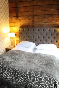 Postel nebo postele na pokoji v ubytování Det Hanseatiske Hotel