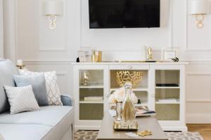 Telewizja i/lub zestaw kina domowego w obiekcie Apartament Golden Place