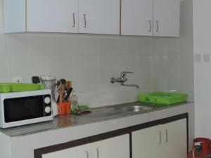 A kitchen or kitchenette at Happy Welcome Bietry 2