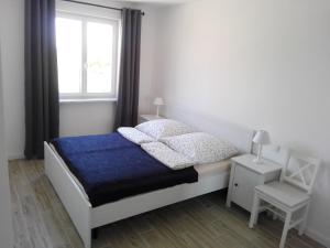 Postel nebo postele na pokoji v ubytování Apartment Rosenberg + 57 fotografií