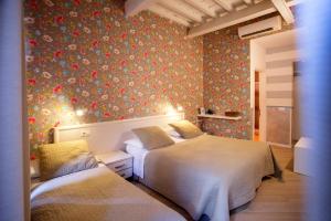 Postel nebo postele na pokoji v ubytování Hotel Bencidormi