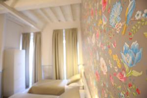 Postel nebo postele na pokoji v ubytování Hotel Bencidormi