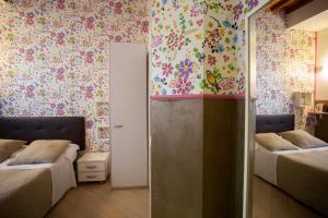 Postel nebo postele na pokoji v ubytování Hotel Bencidormi
