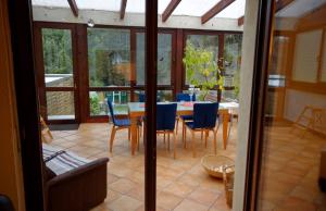 a dining room with a table and chairs at Ferienhaus Lara in Heimbach