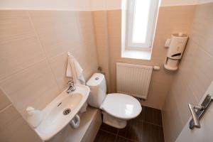 Koupelna v ubytování Apartment Gudi + 15 fotografií