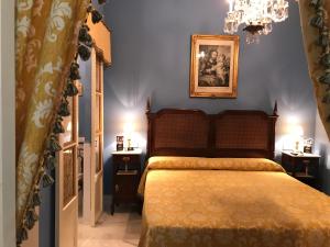 Postel nebo postele na pokoji v ubytování Casa Palacio Jerezana