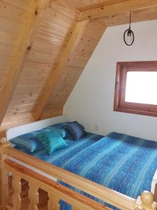 A bed or beds in a room at Vacation Home Nana