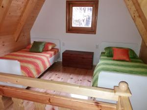 A bed or beds in a room at Vacation Home Nana