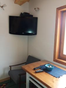 A television and/or entertainment centre at Vacation Home Nana