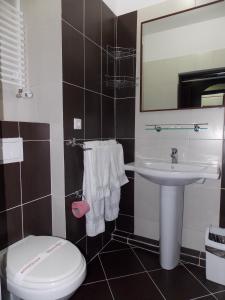 Koupelna v ubytování Hotel Zimbru
