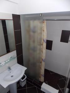Koupelna v ubytování Hotel Zimbru